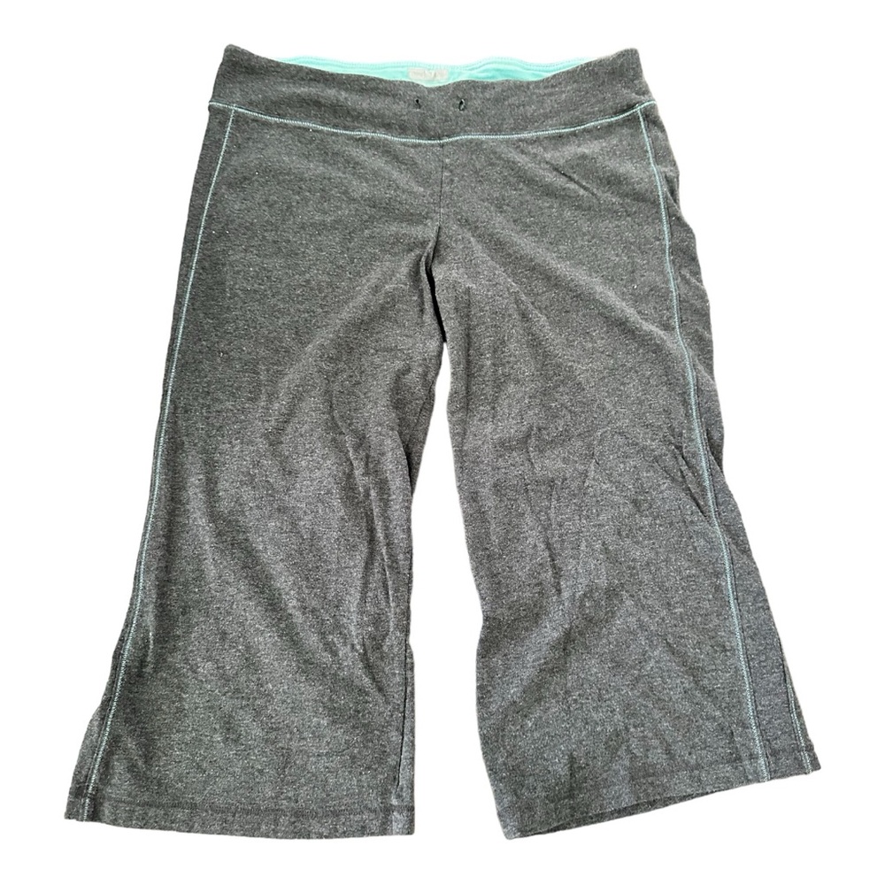# Women’s New Balance workout capri in charcoal gray/light teal in a Size S/M.